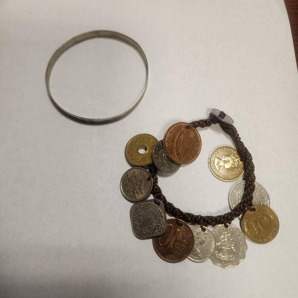 Lot of 2 bracelets. 1 abalone inlay and 1 charm bracelet jb